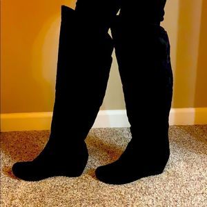 Black pull on over the knee boot